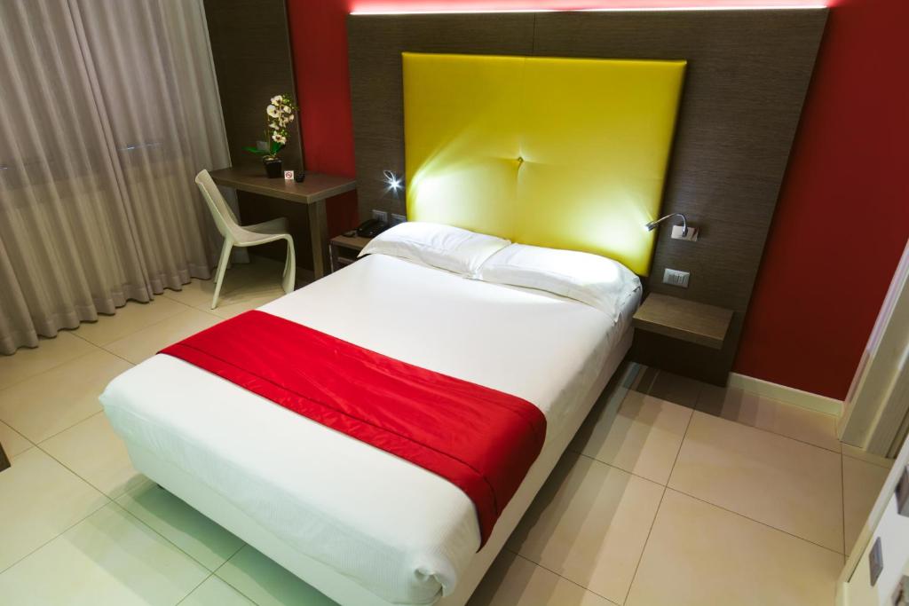 Postel nebo postele na pokoji v ubytování Hotel Calaluna