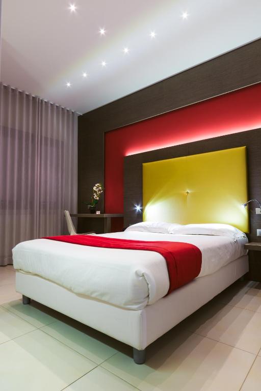 Postel nebo postele na pokoji v ubytování Hotel Calaluna