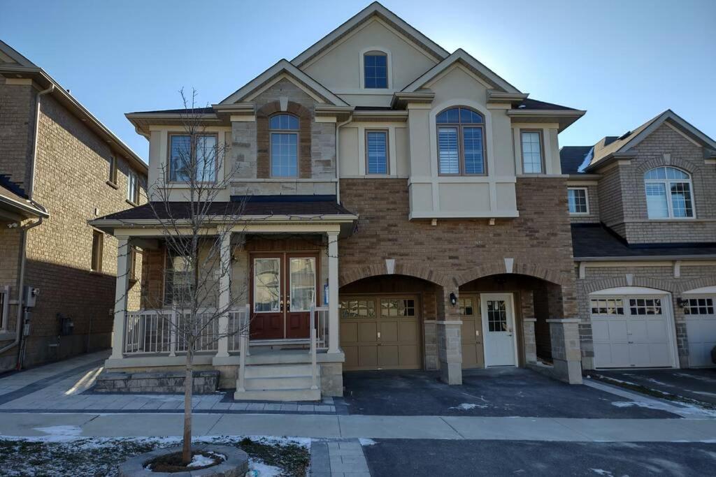 a large brick house with at Prestige Accommodation Self-contained 2 Bedrooms Suite in Ajax