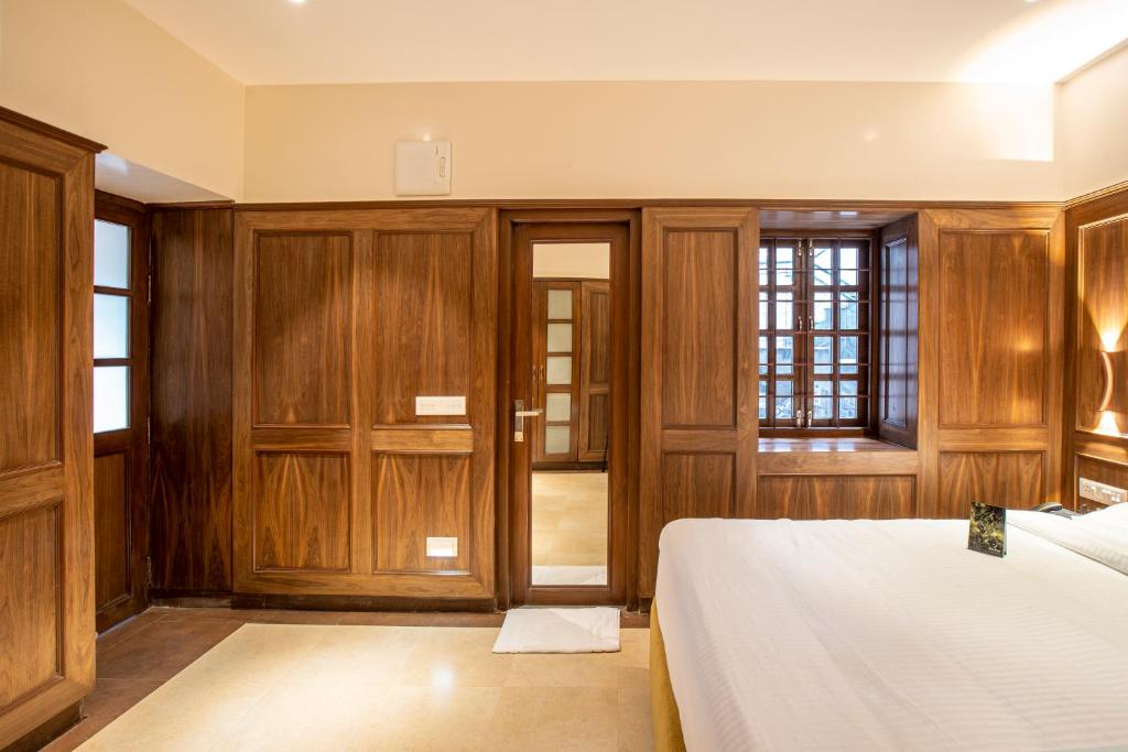 Postel nebo postele na pokoji v ubytování Hotel Raindrops