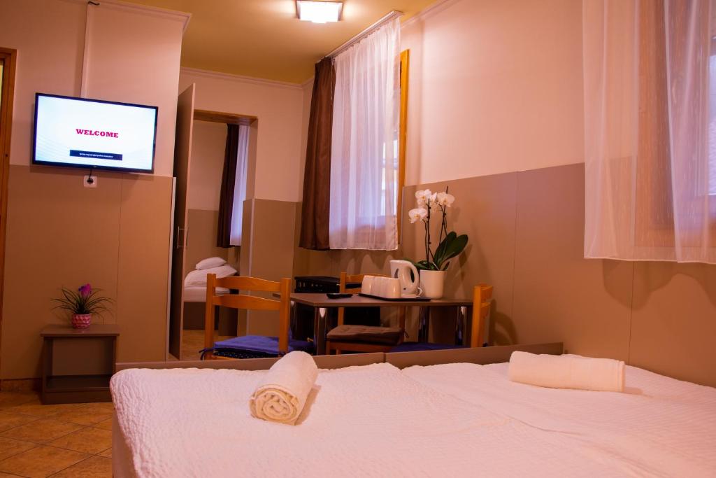 Postel nebo postele na pokoji v ubytování Huli Panzio