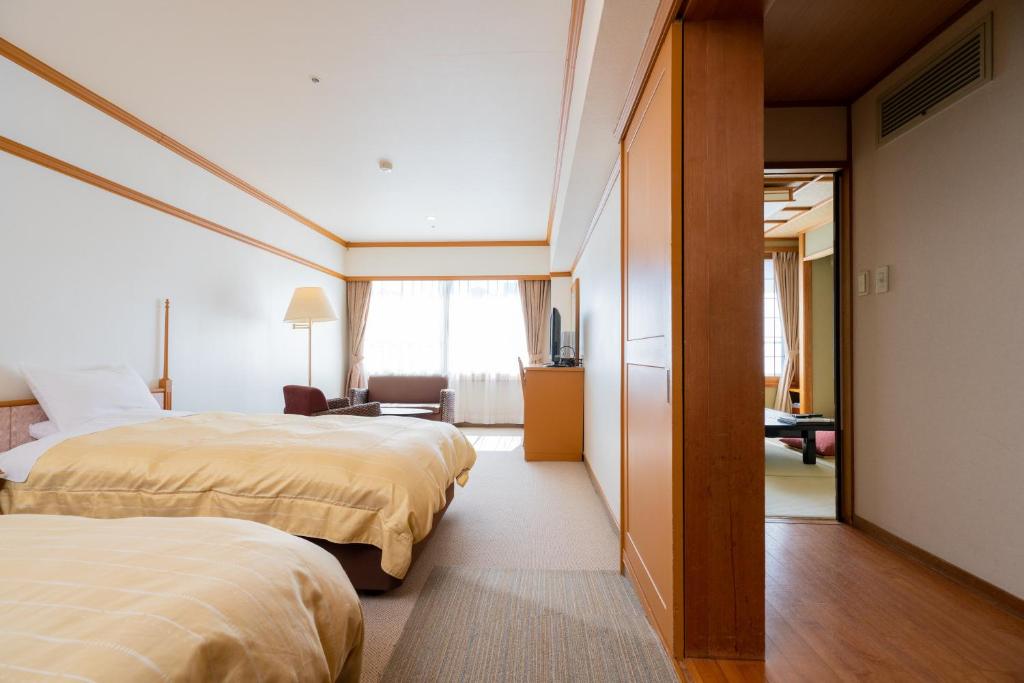 Una cama o camas en una habitación de Ito Kowakien