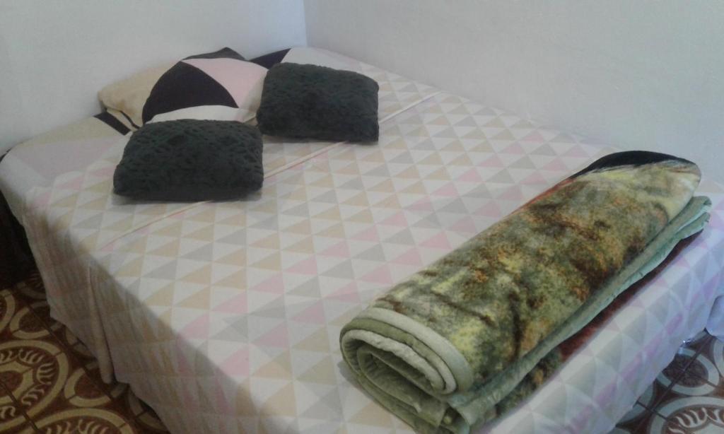 Postel nebo postele na pokoji v ubytování case ti kaf