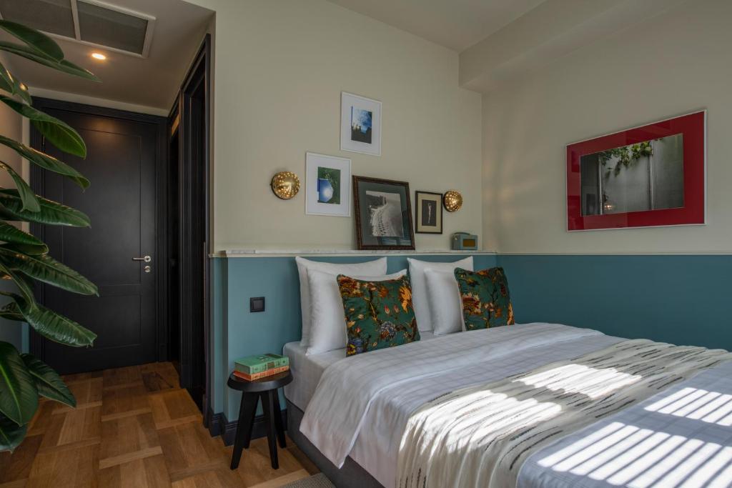 Postel nebo postele na pokoji v ubytování Communal Hotel Plekhanovi