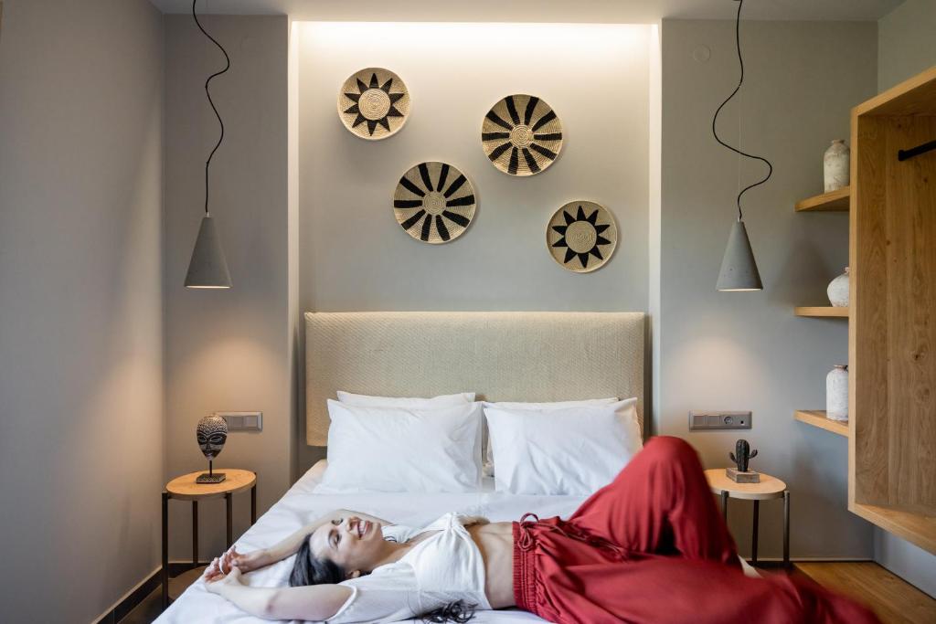 A bed or beds in a room at Costa D' Ifesto