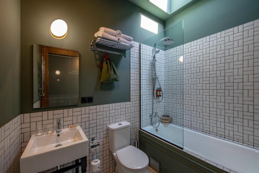 Koupelna v ubytování Communal Hotel Plekhanovi