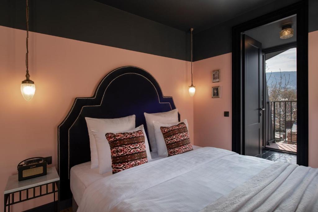 Postel nebo postele na pokoji v ubytování Communal Hotel Plekhanovi