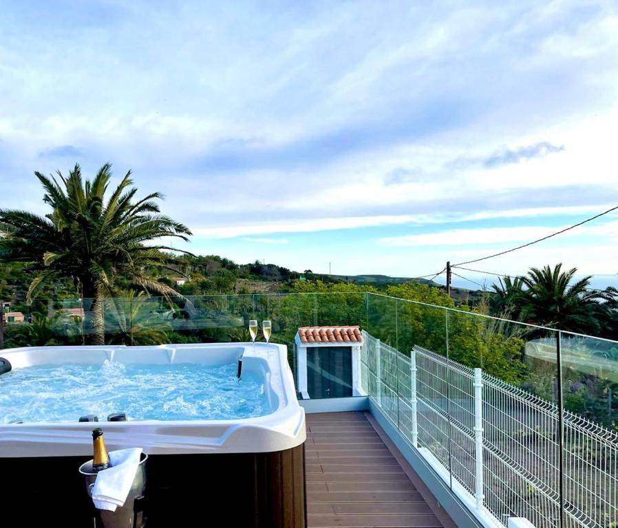 a hot tub on the balcony of a house at Casas Rurales Amparo Las Hayas in Valle Gran Rey