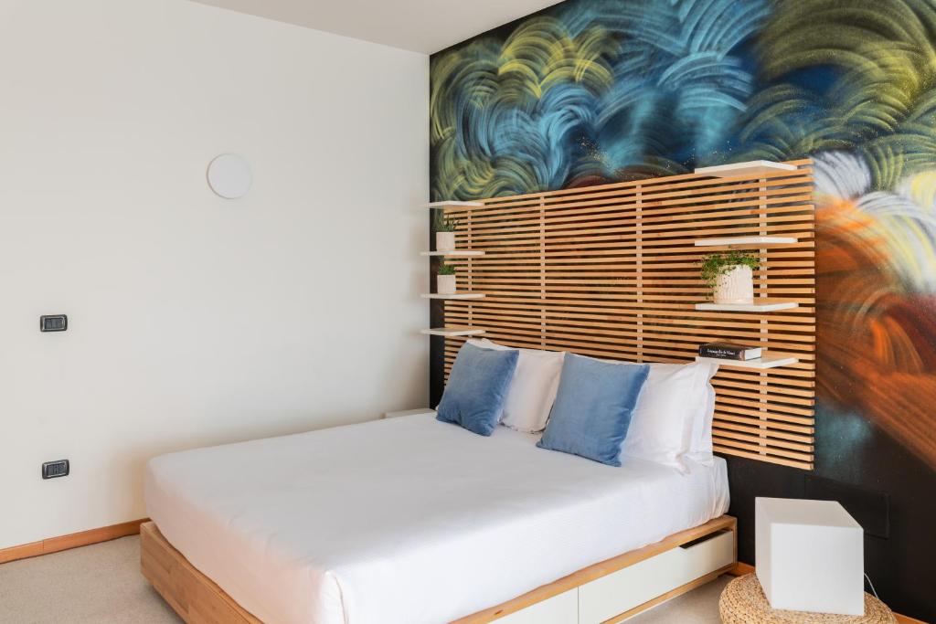 Postel nebo postele na pokoji v ubytování Hotel Borgo Brianteo