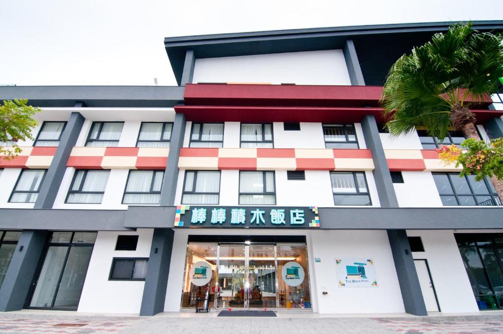 una representación de la parte delantera de un edificio en The Brick Hotel en Taibao