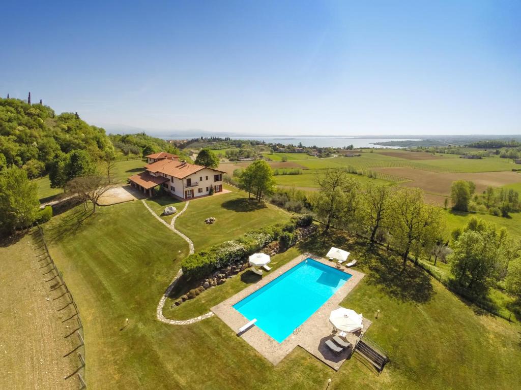 an aerial view of a large estate with a swimming pool at Villa Montecroce in Padenghe sul Garda