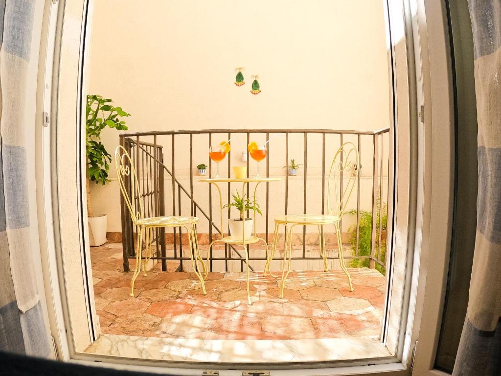 Un balcón o terraza de B&B Kalavrìa
