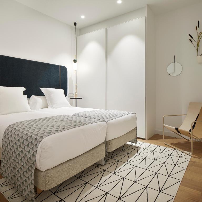 Posteľ alebo postele v izbe v ubytovaní La Belle Ville by FeelFree Rentals