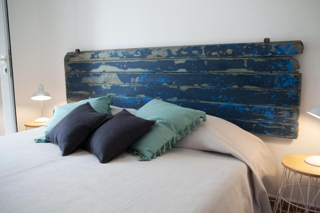 A bed or beds in a room at Comfortable House in Formentera with Garden and Terrace