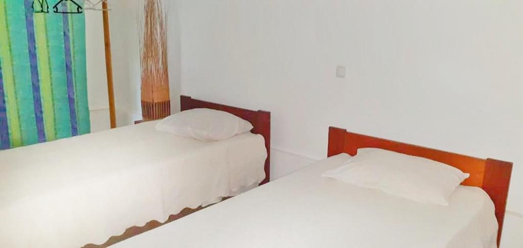 Postel nebo postele na pokoji v ubytování casa Luis