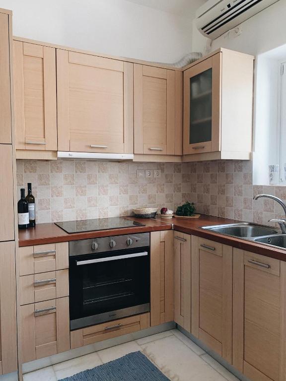 Kuchyň nebo kuchyňský kout v ubytování Maisonette San Tosa