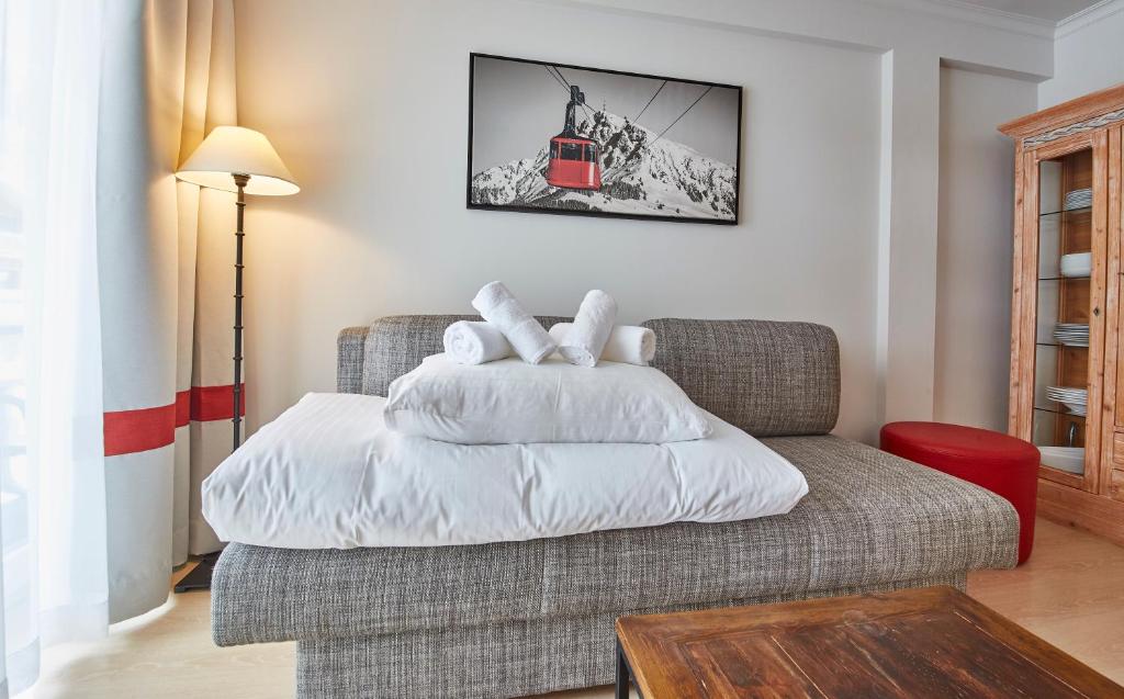 Posteľ alebo postele v izbe v ubytovaní Hüttl Relax Appartements