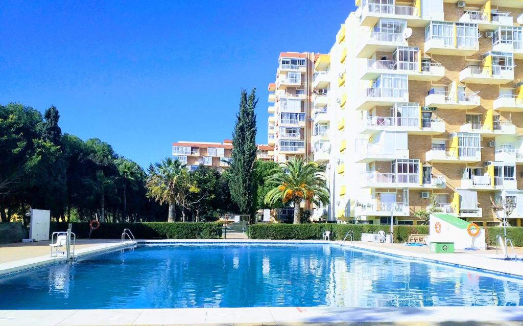 a large swimming pool in front of a building at Agata Views in Benalmádena