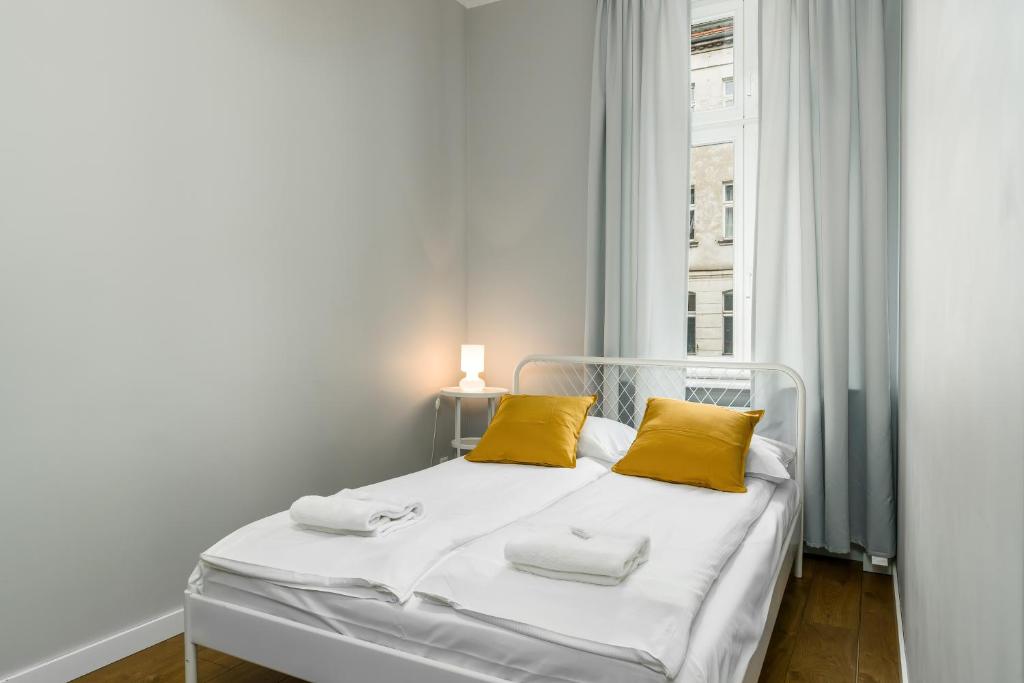 Posteľ alebo postele v izbe v ubytovaní Old Town Apartment Garbary by Noclegi Renters