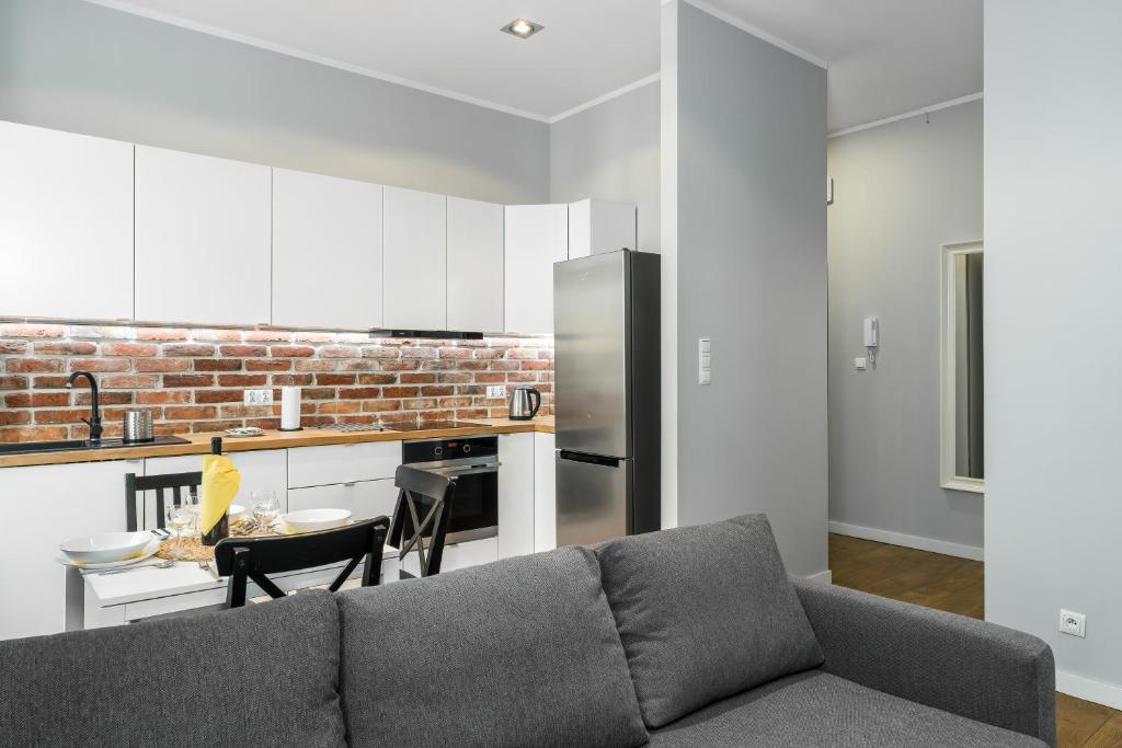 Posedenie v ubytovaní Old Town Apartment Garbary by Noclegi Renters