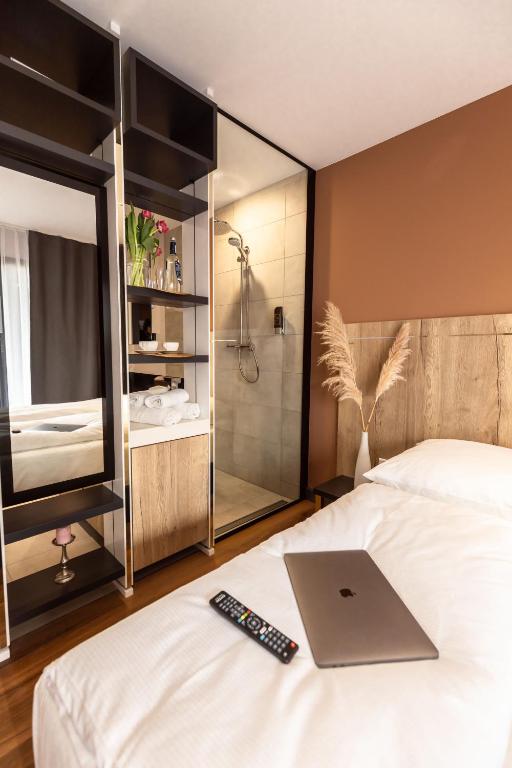Postel nebo postele na pokoji v ubytování 24Seven Hotel Schwabach
