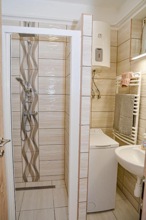 Kúpeľňa v ubytovaní Krisztina Apartman 81