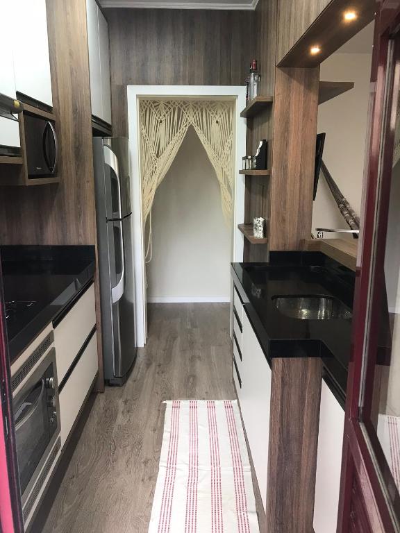  Apto 2 dormitorios ideal para férias e viagem 350 mts do mar.