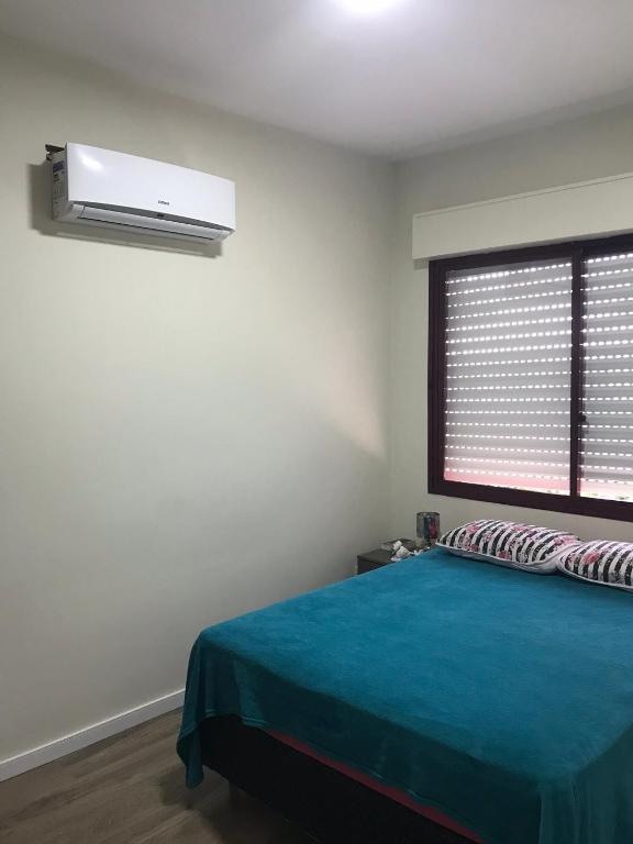  Apto 2 dormitorios ideal para férias e viagem 350 mts do mar.