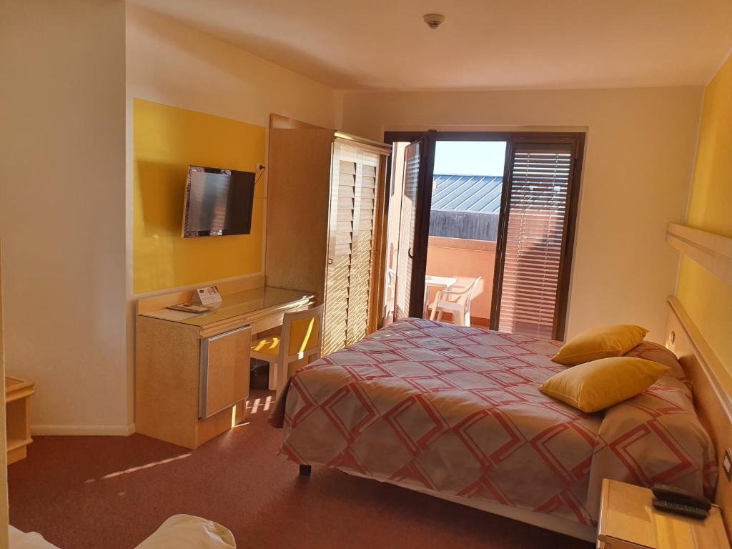 Postel nebo postele na pokoji v ubytování Hotel Antares