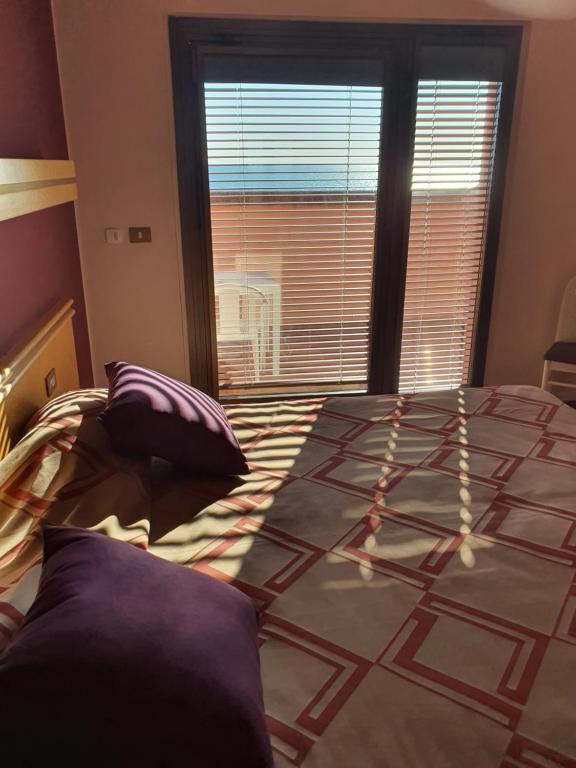 Postel nebo postele na pokoji v ubytování Hotel Antares