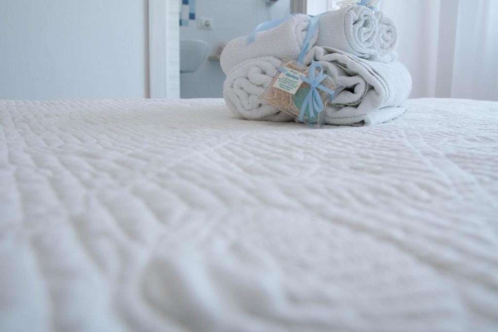 Postel nebo postele na pokoji v ubytování Albergo Medusa