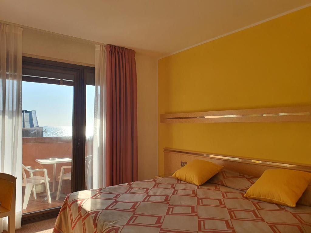 Postel nebo postele na pokoji v ubytování Hotel Antares