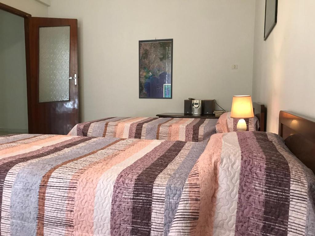 Posteľ alebo postele v izbe v ubytovaní A 2 passi da tutto