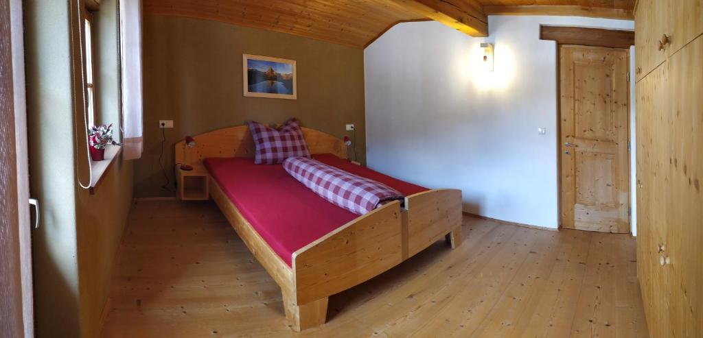 Postel nebo postele na pokoji v ubytování Apartments Ban Guggugg