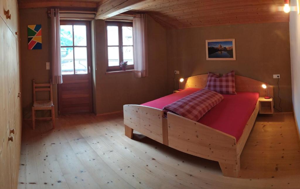 Postel nebo postele na pokoji v ubytování Apartments Ban Guggugg