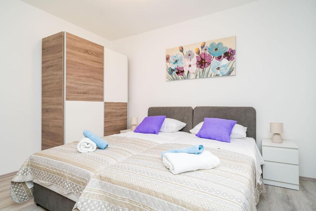 Postel nebo postele na pokoji v ubytování Apartment Cvjetković