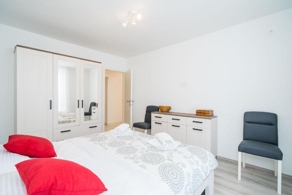 Postel nebo postele na pokoji v ubytování Apartment Cvjetković