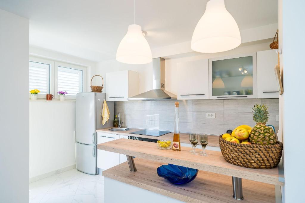 Kuchyň nebo kuchyňský kout v ubytování Apartment Cvjetković