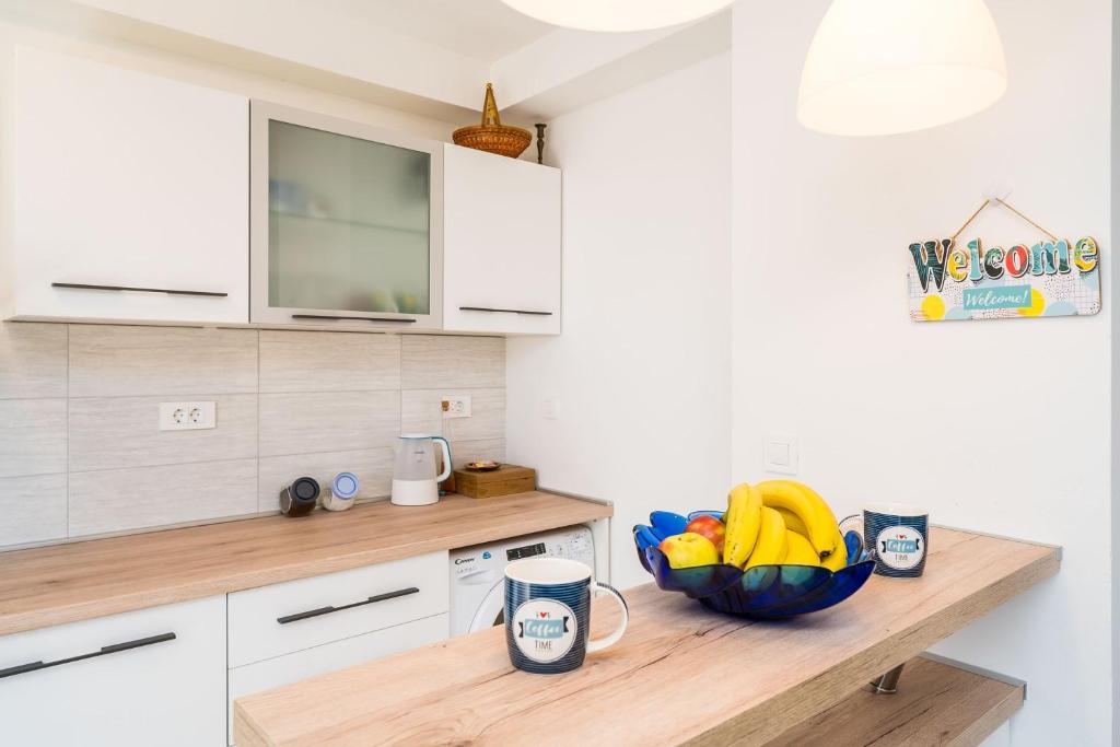 Kuchyň nebo kuchyňský kout v ubytování Apartment Cvjetković
