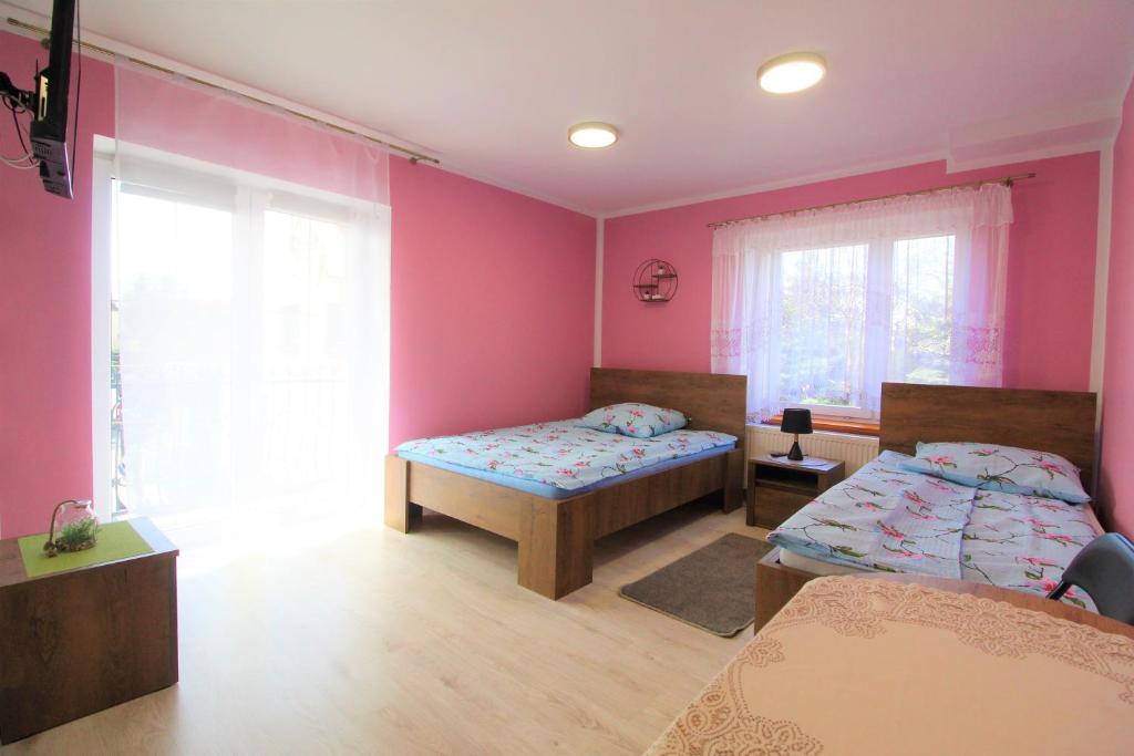 Postel nebo postele na pokoji v ubytování Pokoje u Marty