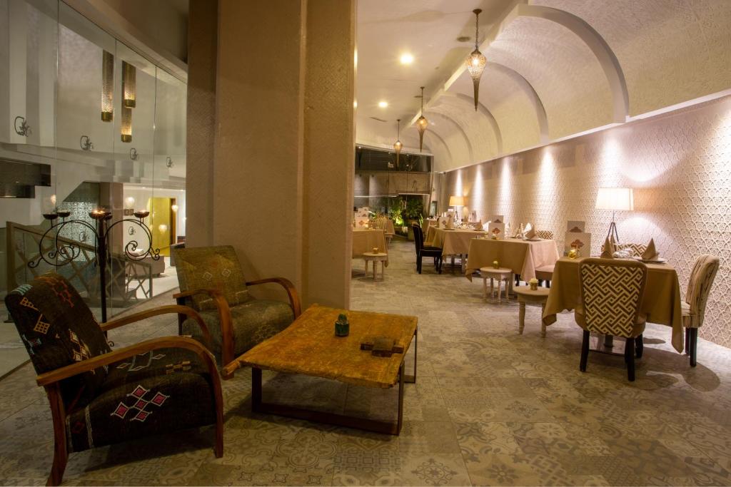 Posezení v ubytování Dellarosa Boutique Hotel and Spa
