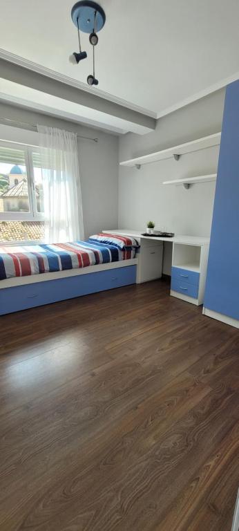 Postel nebo postele na pokoji v ubytování Alma Home Ribadesella VUT1994 AS