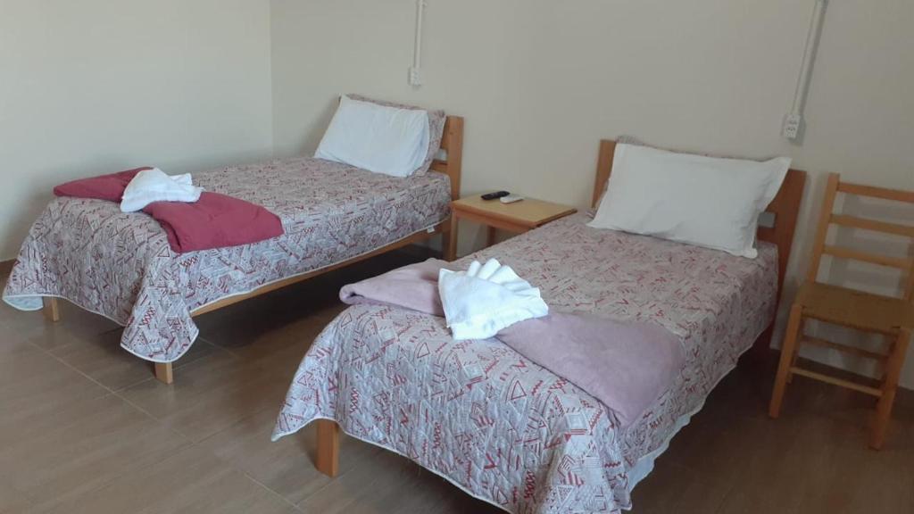 Cama o camas de una habitación en Hotel Veneza