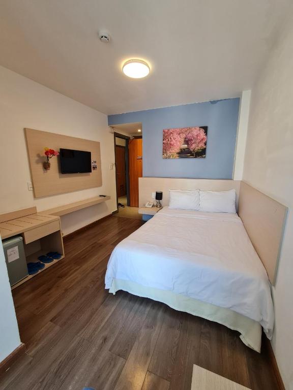Postel nebo postele na pokoji v ubytování Ngan Hoa - Mille Fleurs
