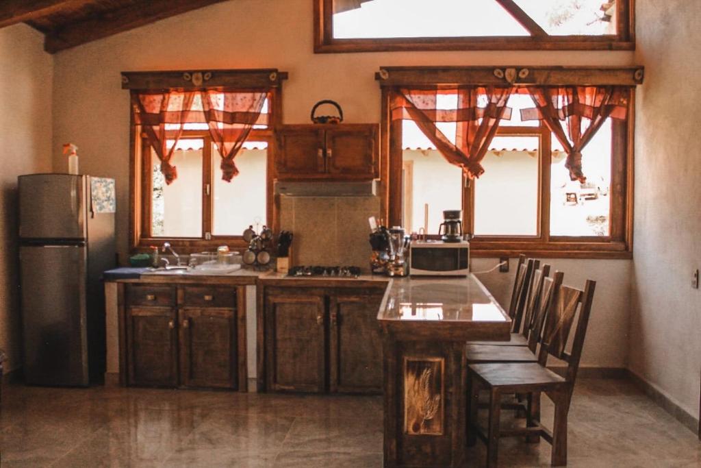 Kuchyň nebo kuchyňský kout v ubytování Cabaña Sol