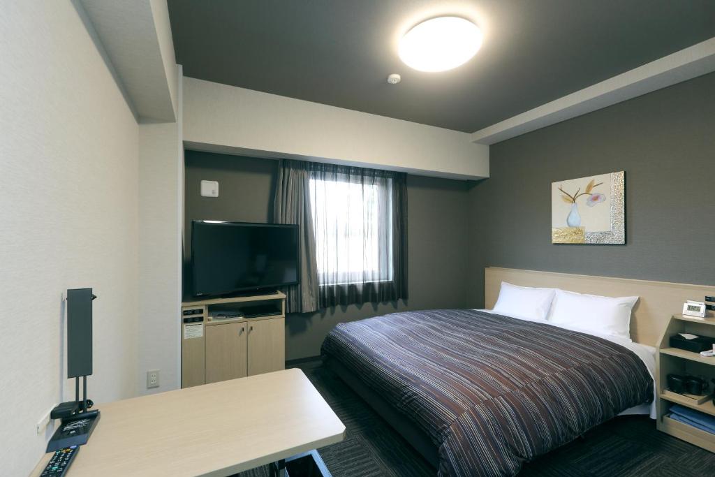 TV a/nebo společenská místnost v ubytování Hotel Route-Inn Shimizu Inter