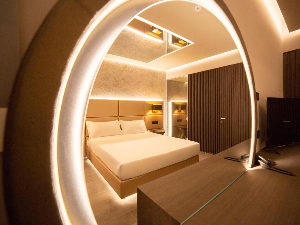 Postel nebo postele na pokoji v ubytování Motel Hotel Charlie