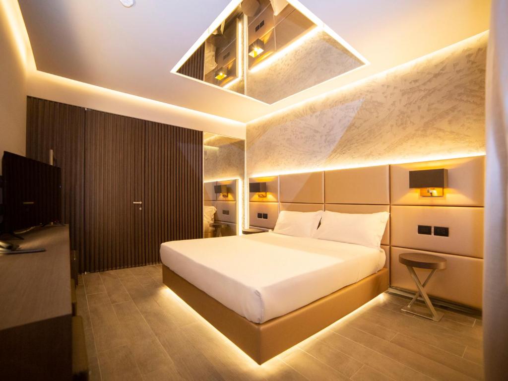 Postel nebo postele na pokoji v ubytování Motel Hotel Charlie