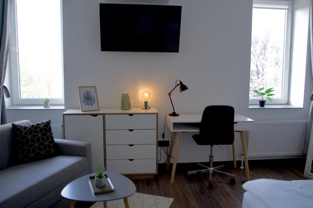 TV a/nebo společenská místnost v ubytování Style Hotel