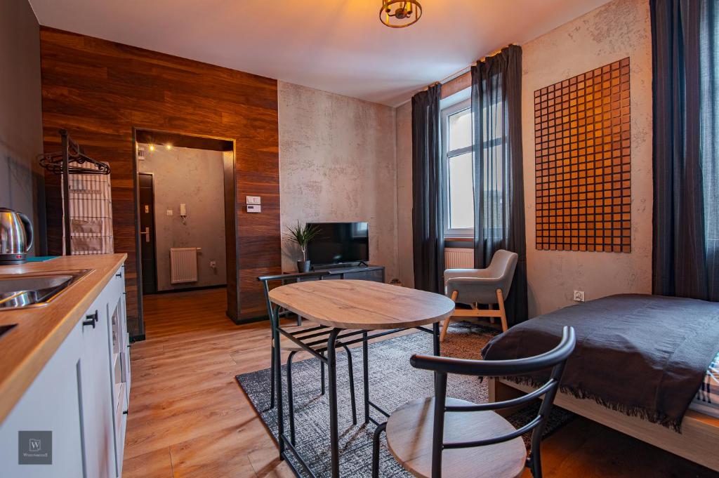 Kuchyňa alebo kuchynka v ubytovaní Apartamenty Wyszyńskiego 2